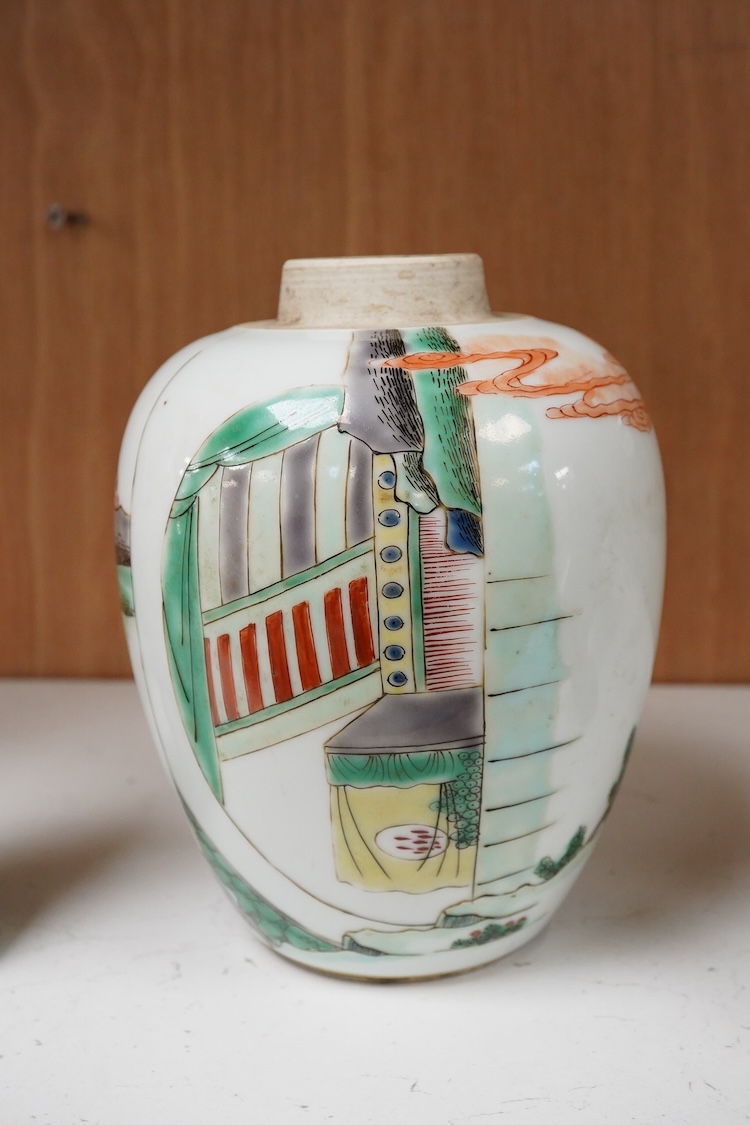 A Chinese 18th century figurine and a 20th century famille verte vase, largest 18cm high
